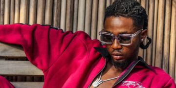 nowthendigital.com__watch woman by omah lay (1)