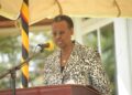 Minister Checking UCE 2022 results via SMS