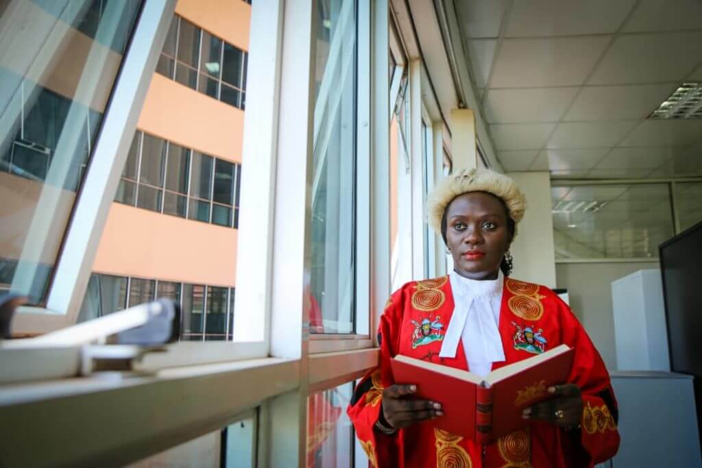 Lady Justice Lydia Mugambe background