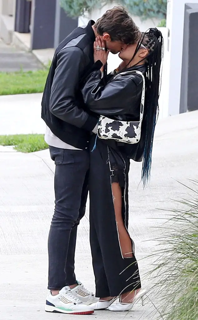 Tessa Thompson sharing a kiss with Australian model Zac Stenmark
