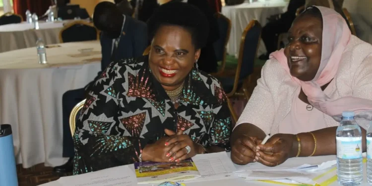 Minister Betty Amongi with Safia Jjuko Nalule chairperson EOC